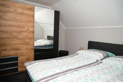 Ein Bett oder Betten in einem Zimmer der Unterkunft Ferienwohnung am Kalten Bach