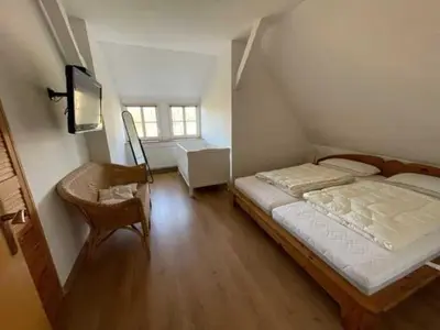 Ein Bett oder Betten in einem Zimmer der Unterkunft Ferienwohnung 