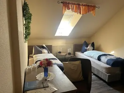 Ein Bett oder Betten in einem Zimmer der Unterkunft Pension Krahmer