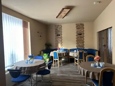 Ein Sitzbereich in der Unterkunft Pension Krahmer