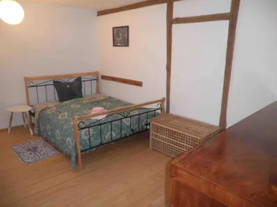 Ein Bett oder Betten in einem Zimmer der Unterkunft Erholen im Kranichhof, Garten, Sauna - Nähe Heide
