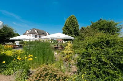 Ein Garten an der Unterkunft Hotel Kloster Nimbschen 4 Sterne