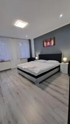 Ein Bett oder Betten in einem Zimmer der Unterkunft CT Apartment Wurzen
