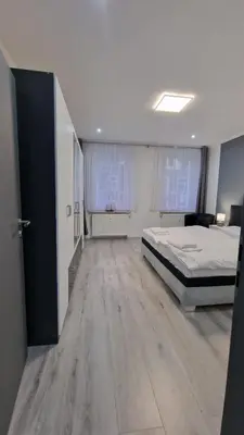 Ein Bett oder Betten in einem Zimmer der Unterkunft CT Apartment Wurzen