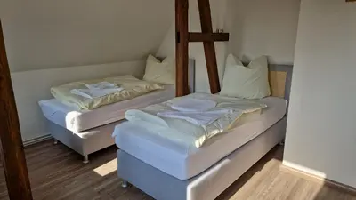 Ein Bett oder Betten in einem Zimmer der Unterkunft Schillerstrasse