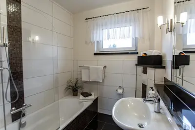 Ein Badezimmer in der Unterkunft Ferienapartments Pension Elsternest