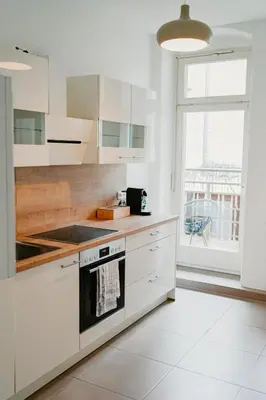 Küche/Küchenzeile in der Unterkunft Ferienwohnung Elbzauber für 6 l Parkplatz l Balkon