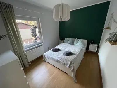 Ein Bett oder Betten in einem Zimmer der Unterkunft WaldmeisterInn