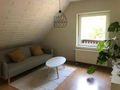 Ein Sitzbereich in der Unterkunft WaldmeisterInn