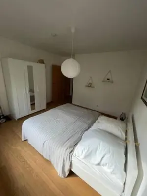 Ein Bett oder Betten in einem Zimmer der Unterkunft WaldmeisterInn