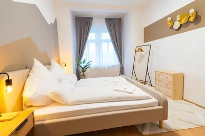 Ein Bett oder Betten in einem Zimmer der Unterkunft StadtNatur Apartment am Küchwald - 2 SZ mit Balkon, WASCHMASCHINE, Streaming-TV, Badewanne, Arbeitsplatz