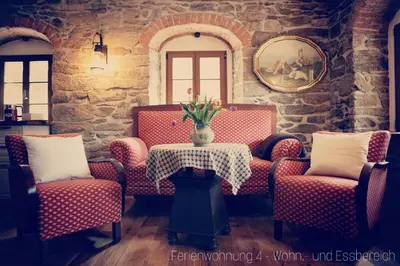 Ein Sitzbereich in der Unterkunft Apartment Grubenhaus20