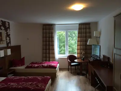 Ein Bett oder Betten in einem Zimmer der Unterkunft Heiterer Blick am Malerweg Pirna
