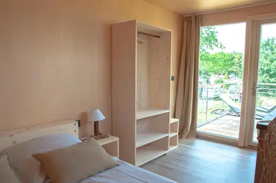 Ein Bett oder Betten in einem Zimmer der Unterkunft Haus Schnatterinchen