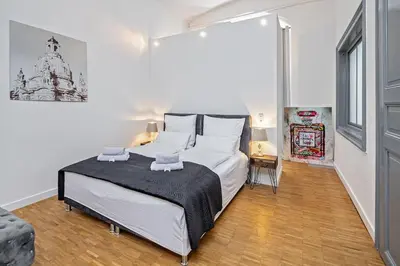Ein Bett oder Betten in einem Zimmer der Unterkunft Loft im Denkmal N°2