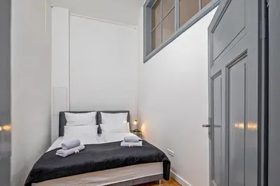 Ein Bett oder Betten in einem Zimmer der Unterkunft Loft im Denkmal N°2