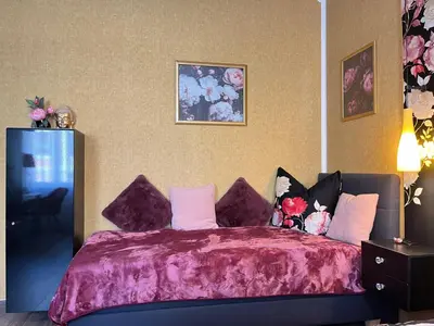 Ein Bett oder Betten in einem Zimmer der Unterkunft Ferienwohnungen Auszeit