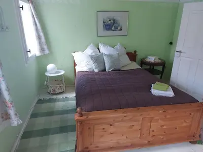 Ein Bett oder Betten in einem Zimmer der Unterkunft Großes Charmantes Ferienhaus in Nassau
