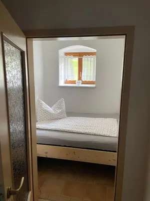 Ein Bett oder Betten in einem Zimmer der Unterkunft Energietanken vor den Toren Dresdens -barrierefrei-