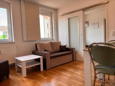 Ein Sitzbereich in der Unterkunft Ferienwohnung Freital-City