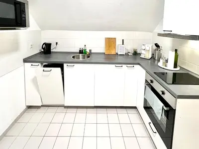 Küche/Küchenzeile in der Unterkunft Modernes Apartment mit Blick zur Elbe