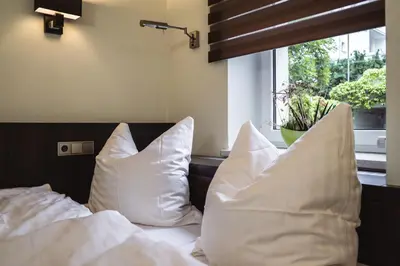 Ein Bett oder Betten in einem Zimmer der Unterkunft athome IHR Apartment