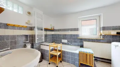 Ein Badezimmer in der Unterkunft Karls Ferienhaus