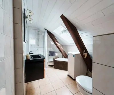 Ein Badezimmer in der Unterkunft MittenDrin