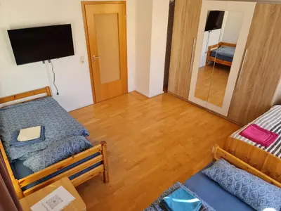 Ein Bett oder Betten in einem Zimmer der Unterkunft Ferienwohnung Dippoldiswalde