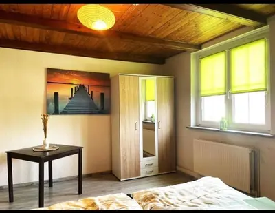 Ein Bett oder Betten in einem Zimmer der Unterkunft Lausitzhof