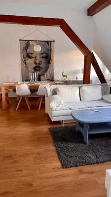 Ein Bett oder Betten in einem Zimmer der Unterkunft Dresden City