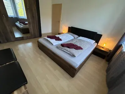 Ein Bett oder Betten in einem Zimmer der Unterkunft Ruhige Maisonettewohnung auf dem Kaßberg