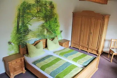 Ein Bett oder Betten in einem Zimmer der Unterkunft Pension Zumpe