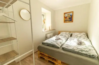 Ein Bett oder Betten in einem Zimmer der Unterkunft Alte Eizmanufaktur *2 Pers*