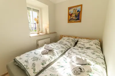 Ein Bett oder Betten in einem Zimmer der Unterkunft Alte Eizmanufaktur *2 Pers*