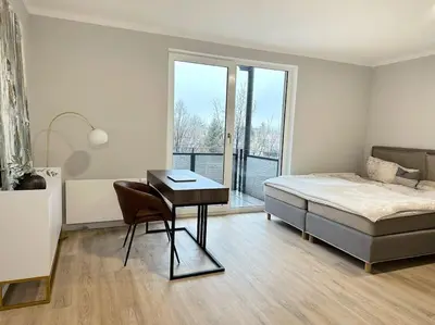 Ein Bett oder Betten in einem Zimmer der Unterkunft Neu & Schick: Küche inkl. Kaffee