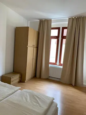 Ein Bett oder Betten in einem Zimmer der Unterkunft Apartments SMAG Barbiergasse