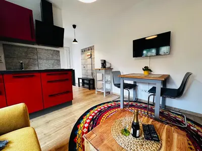 Ein Sitzbereich in der Unterkunft Fischis Ferienwohnung Struppen