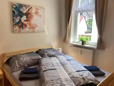 Ein Bett oder Betten in einem Zimmer der Unterkunft Alles Gute Wehlen