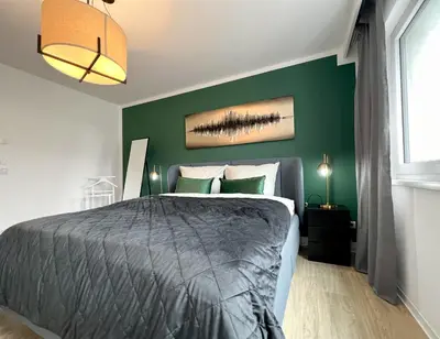 Ein Bett oder Betten in einem Zimmer der Unterkunft Luxury 3 Room Chemnitz