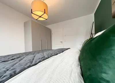 Ein Bett oder Betten in einem Zimmer der Unterkunft Luxury 3 Room Chemnitz