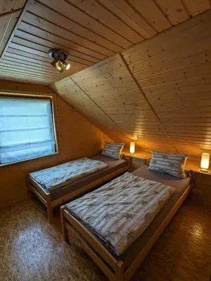 Ein Bett oder Betten in einem Zimmer der Unterkunft Ferienwohnung Abendschein
