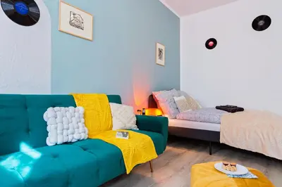 Ein Bett oder Betten in einem Zimmer der Unterkunft ‣ Tschaikowski Suite #Chemnitz