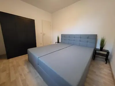 Ein Bett oder Betten in einem Zimmer der Unterkunft City Apartment Bischofswerda Holliday and Work