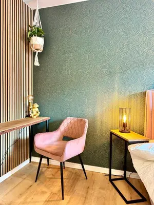 Ein Sitzbereich in der Unterkunft Queen Loui: Comfy Apartment mit Tiefgarage