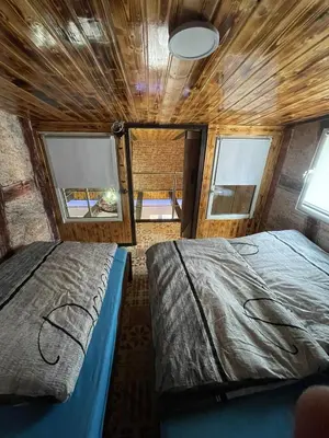 Ein Bett oder Betten in einem Zimmer der Unterkunft Buri`s Seenlandhaus