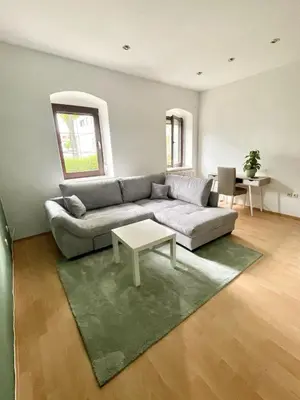 Ein Sitzbereich in der Unterkunft Ferienwohnung am Rathaus