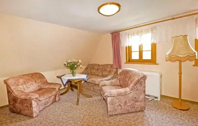Ein Sitzbereich in der Unterkunft Ferienwohnung Neuhausen