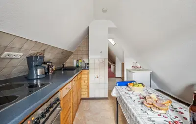 Küche/Küchenzeile in der Unterkunft Ferienwohnung Neuhermsdorf