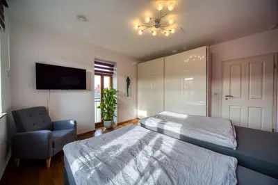 Ein Bett oder Betten in einem Zimmer der Unterkunft Villa-Harmonie Dresden